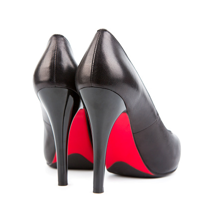 red soles on Louboutin shoes